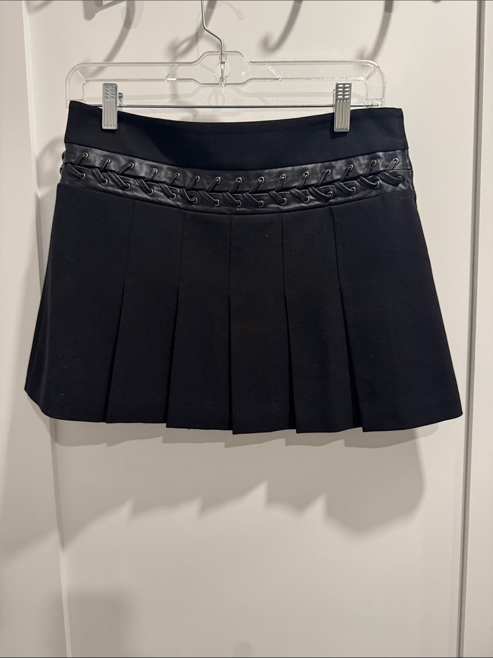 BCBGMaxAzria Black Pleated Mini Skirt with leather lace detail